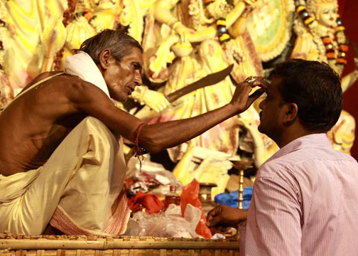 kumkuma on the forehead in temples